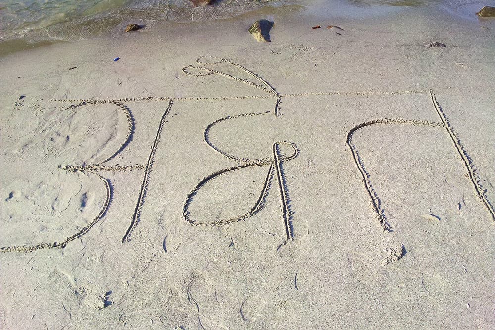 Advait written in sand