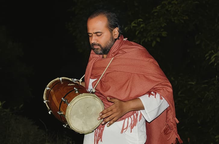 Waking up the students in the morning at the Advait Learning Camp